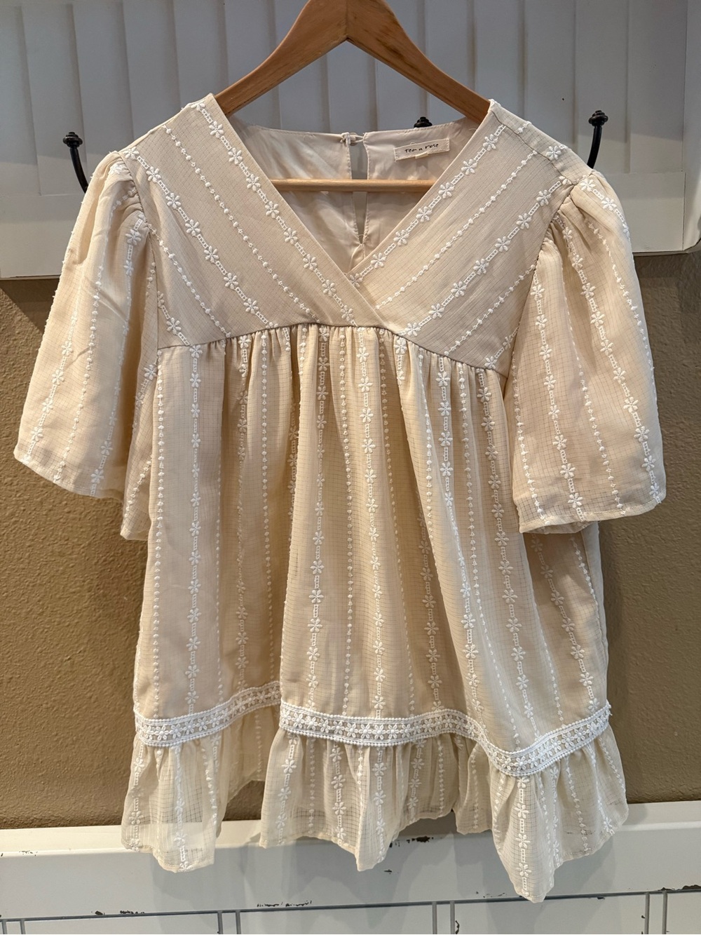 NWOT Women's Beige Embroidered Ruffle Hem Blouse